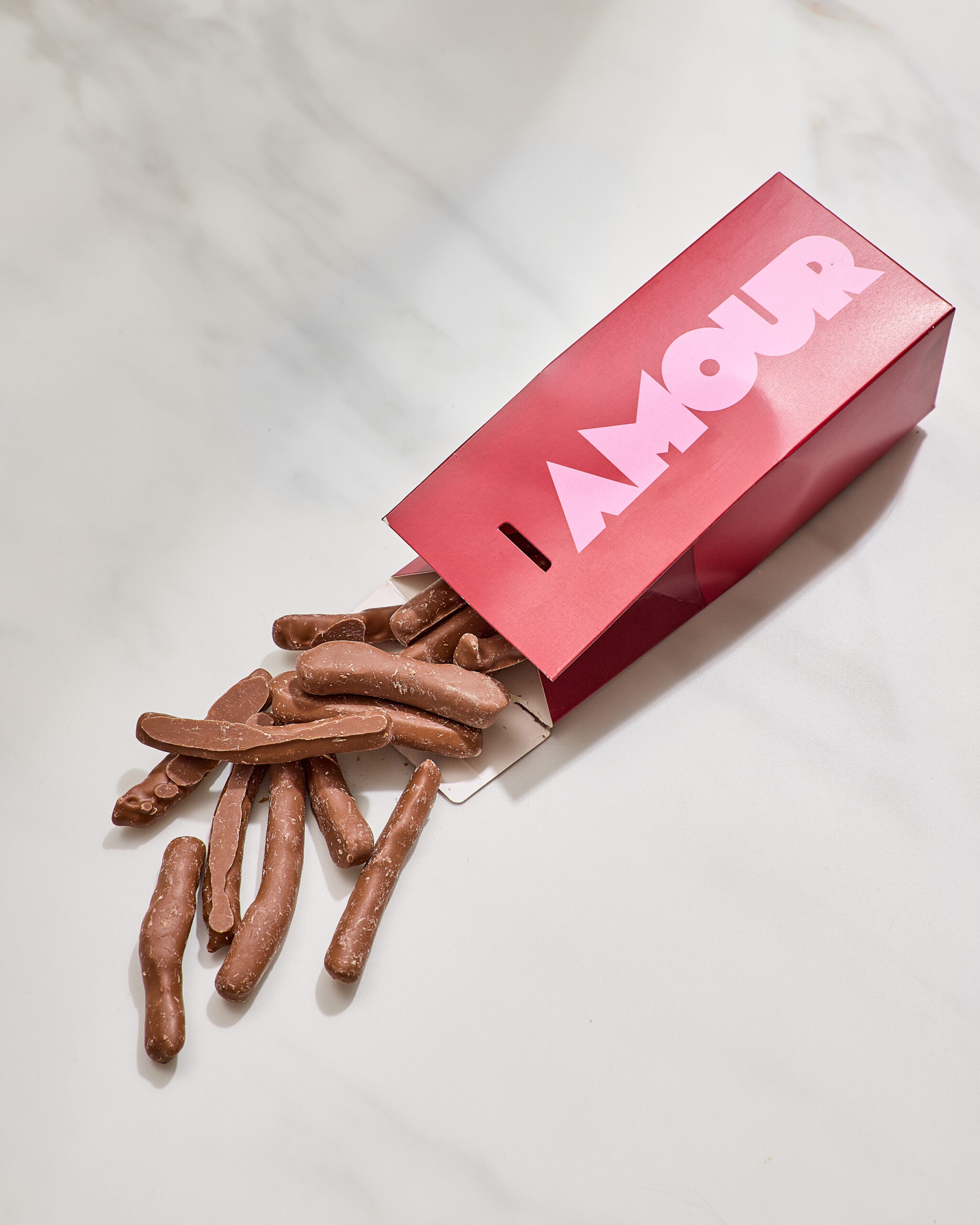 Lamelles de citrons confits enrobées de chocolat au lait